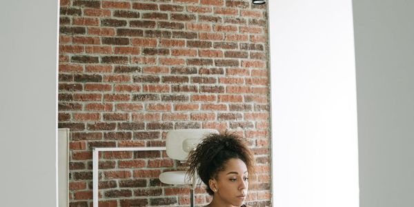 A calm, empty space with a yoga mat ready for practice.